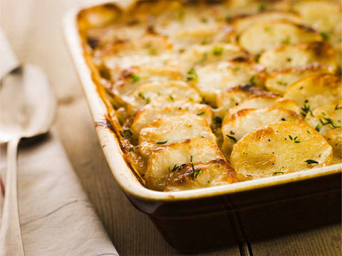 Pommes de terre boulangère au bacon et tomates confites