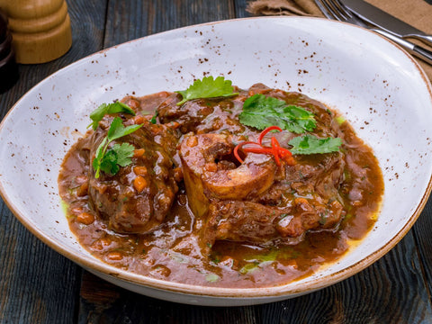 Braised Pork Osso Bucco with Tomatoes and Italian Herbs