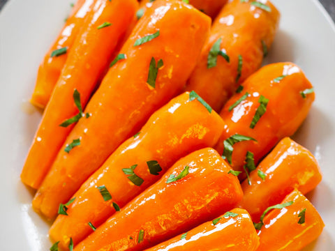 Bébé carottes au beurre d’orange et gingembre